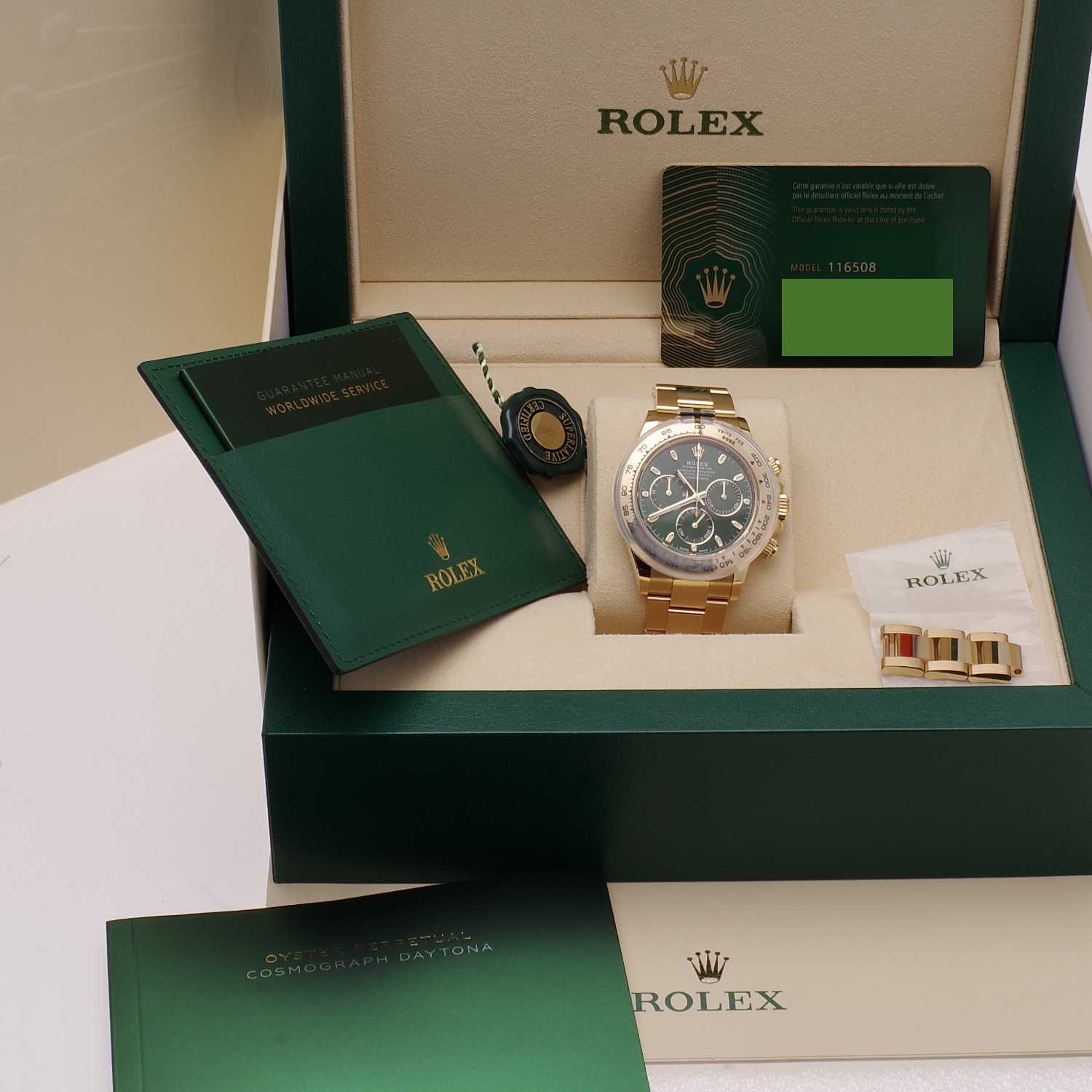 Rolex Daytona 116508 green dial 18K gold new unworn rolex-daytona-116508-green-dial-13